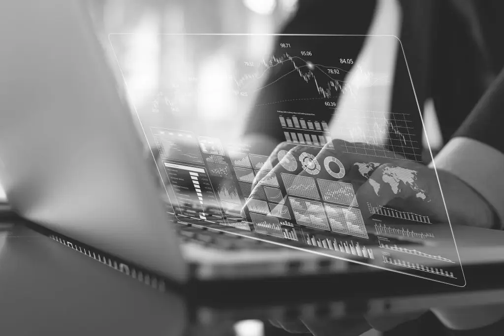 close-up-businessman-laptop-data-insights-technology