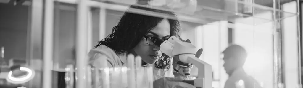 Ambitious-Young-Biotechnology-Specialist-working -Advanced-Equipment